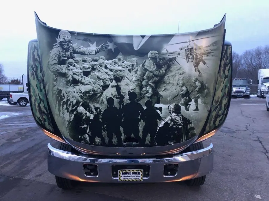 Truck hood airbrushed with a tribute mural