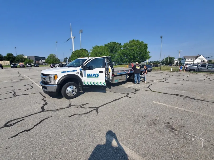 White Marc's flatbed on a job
